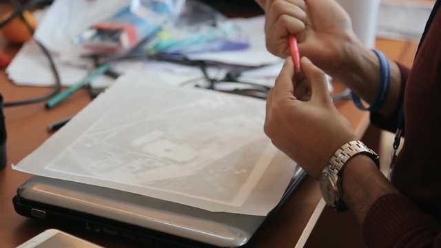 Architect draws territory and its surrounding area on existing building