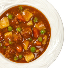 Slow Cooker Beef Stew Isolated on white. Selective focus.