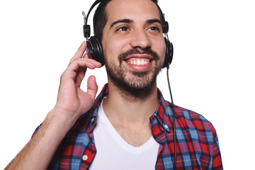 Young handsome man listening to music