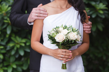 Cream and green bridal bouquet of roses and alstroemeria flowers