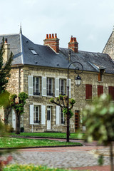 Typical french village street with retro-style lanterns