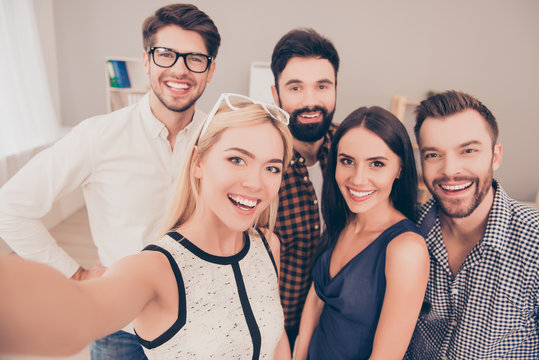 happy young successful group of businesspeople   make selfie pho