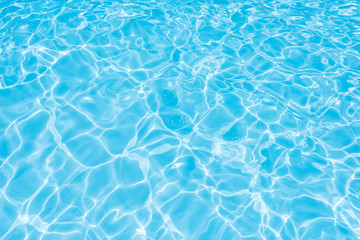 Fototapeta na wymiar Water in swimming pool, Blue Water with sun reflection, Water effect with sun reflection in swimming pool
