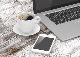 Fototapeta na wymiar Laptop smartphone and coffee cup on wood. 3d rendering.