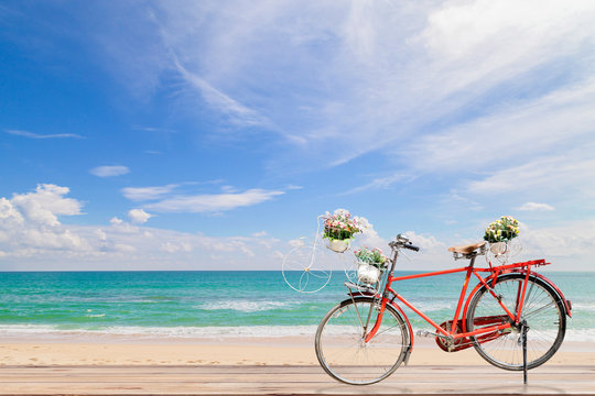 Old  bicycle  on wood with Turquoise sea , beautiful sea beach a