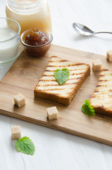 toasts bread wooden cutting board