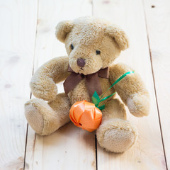 Teddy bear on wood pallet background