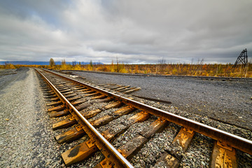 Railway track. Late autumn in the Arctic tundra.