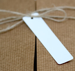 white  address label on a brown cardboard