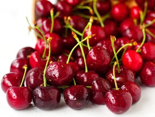 tasty juicy ripe cherries on a wooden background,selective focus