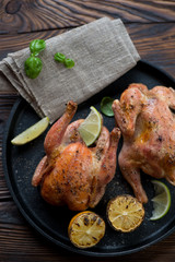 Close-up of whole roasted chickens, high angle view, studio shot