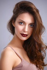 Naklejka premium Portrait of beautiful woman , isolated on gray background