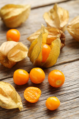 Ripe physalis on a grey wooden table © 5second