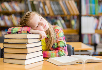 Teen girl sleep in library