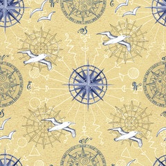 Nautical pattern with gulls and compass on yellow background