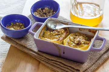 Baked apple with honey and pistachio nuts