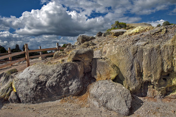 Fototapeta premium Sulfur from Whakarewarewa Geyser at Te Puia thermal park in geothermal valley of Rotorua, New Zealand