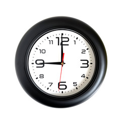 Big round wall clock, with a black rim on a white background close-up and arrows showing nine o'clock