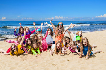 Group of happy children on the beach © Shmel