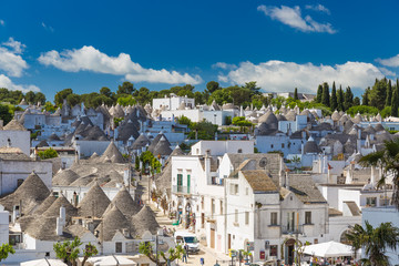 Generic view of Alberobello with trulli roofs and terraces, Apulia region, Southern Italy - obrazy, fototapety, plakaty
