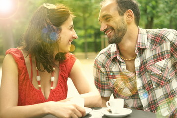 Couple having a cofee in the park