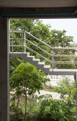 white railing staircase,outdoor apartment