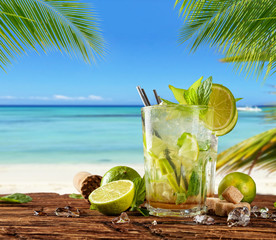 Summer drink with blur beach on background