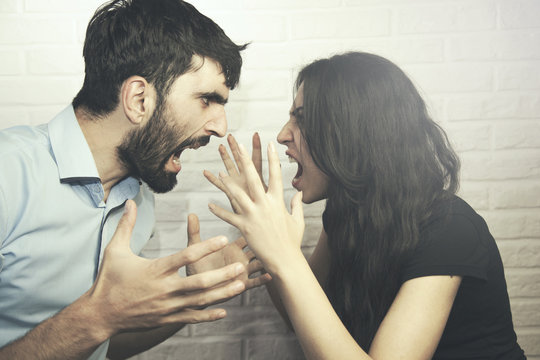 woman and man in fight