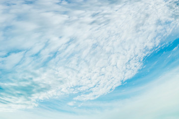 Beautiful  blue sky with light Spindrift clouds , outdoor nature background
