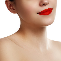 Close-up of woman's lips with bright fashion red makeup