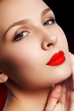 Sexy lips. Beauty red lips makeup detail. Beautiful make-up