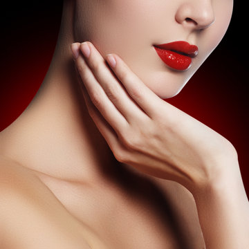 Sexy lips. Beauty red lips makeup detail. Beautiful make-up