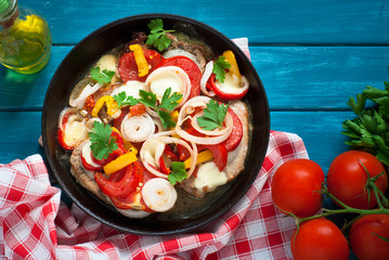 Pork baked with vegetables.