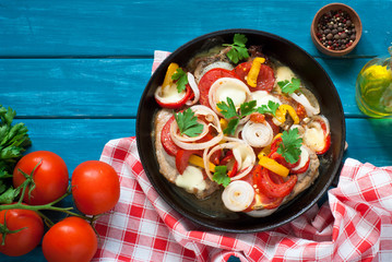 Pork baked with vegetables.