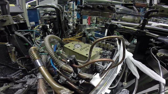 Machinery and Equipment In A Textile Factory / Automated machines at work in textile factory close up HD1080p