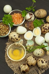 Health & Diet quail eggs on the kitchen table. Some fresh eggs of quail on the table. Quail eggs ready to eat. Advertising on trading with eggs. 

