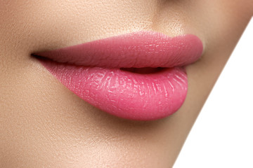 Perfect smile. Beautiful full pink lips. Pink lipstick. Gloss lips