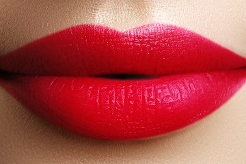 Obraz premium Perfect red lips. Sexy girl mouth close up. Beauty young woman smile