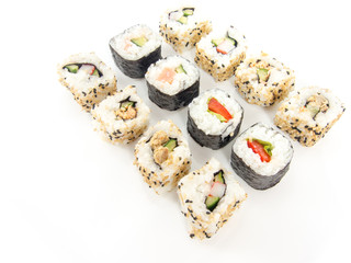 assorted delicious japanese traditional sushi over white