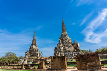Fototapeta premium Ayutthaya Historical Park stupa under blue sky
