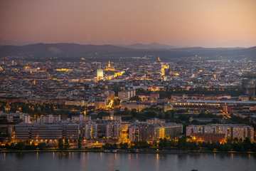 Fototapeta na wymiar Skyline of Vienna and Danube in magnificent sunset, Austria