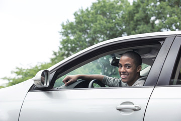 Teenagers driving car