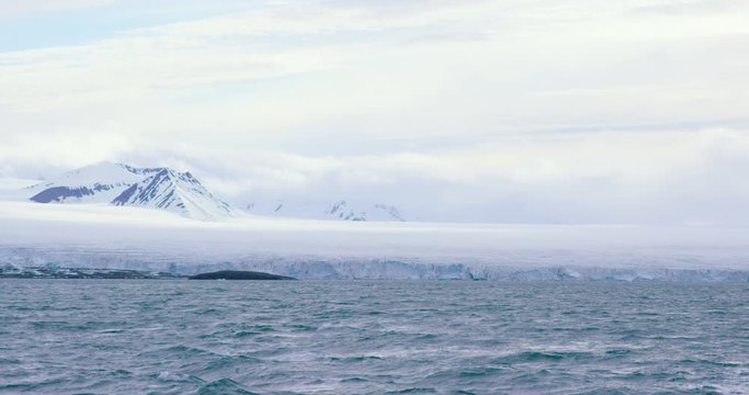 Slow motion of a massive glacier in the arctic