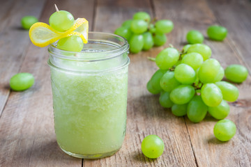 Healthy smoothie with green grape, lemon and honey, horizontal