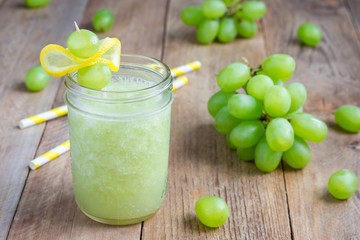 Healthy smoothie with green grape, lemon and honey, horizontal