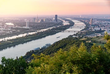 Zelfklevend Fotobehang Skyline of capital city Vienna and Danube Island with the Donau City , Austria © auergraphics
