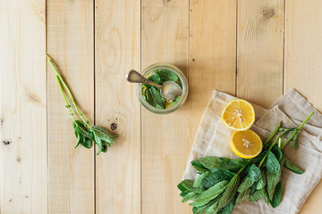 ingredients for homemade lemonade in wooden interior