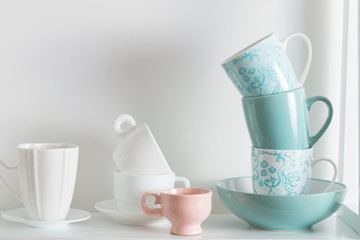 Clean dishes on wooden shelf