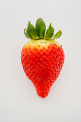 Closeup of not fully ripe strawberry