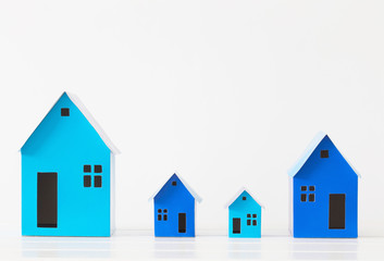 blue paper houses on white background